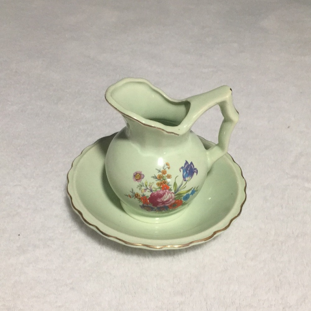 Small light green pitcher with flowers & matching bowl. Both trimmed in gold